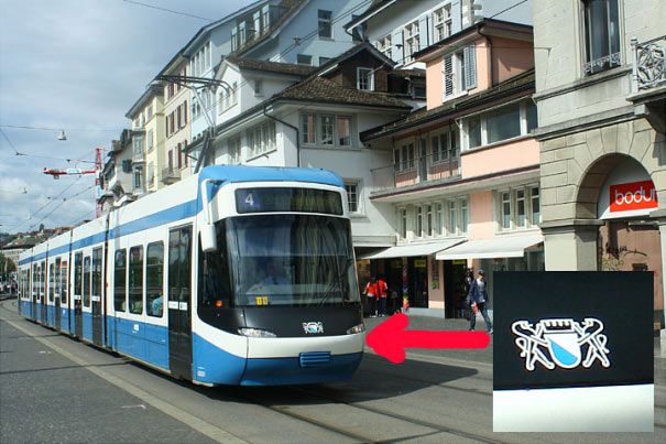 Curyšská nízkopodlažní tramvaj Cobra se znaky města Curych na čele