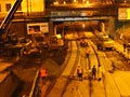 Úpravy podloží pod kolejištěm a vozovkou večer 24. 3. 2012