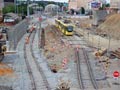 Souprava 344+345 projíždí stavbou u nádraží 5. 6. 2017